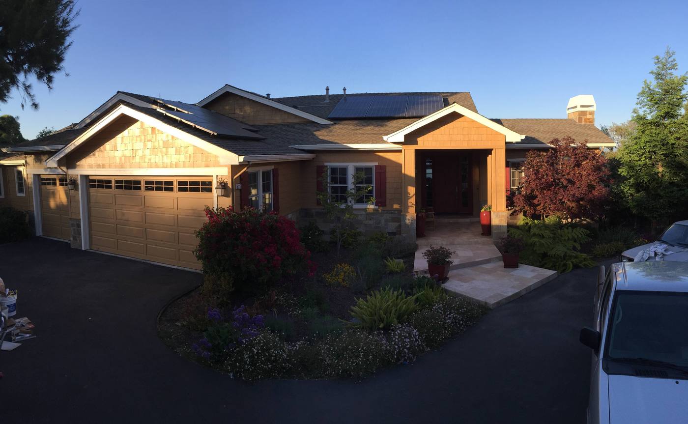 Craftsman bungalow with a fresh two-tone exterior paint job by Color Pros